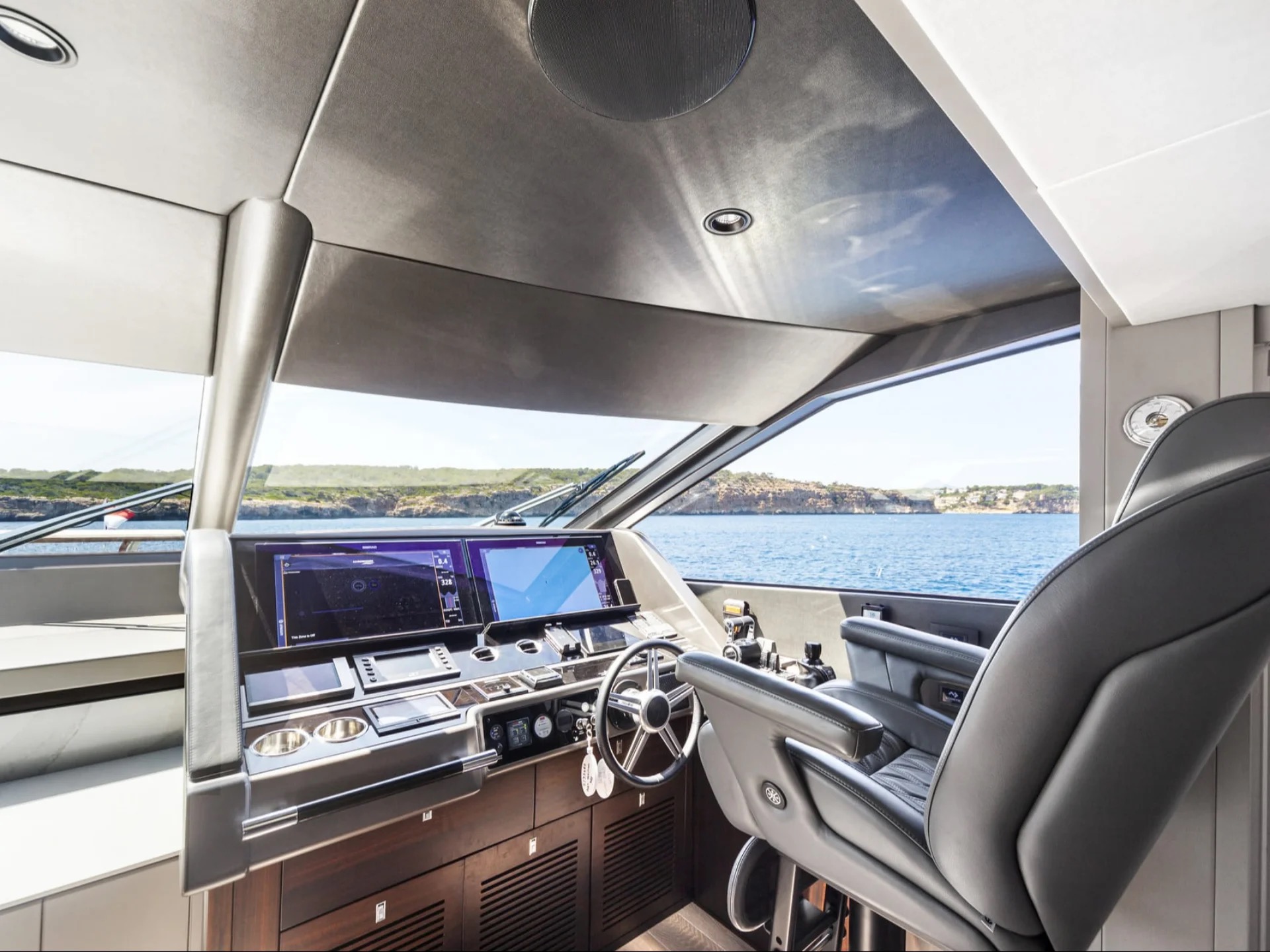 M/Y Junior Sunseeker 88 bridge helm station — luxury yacht charter