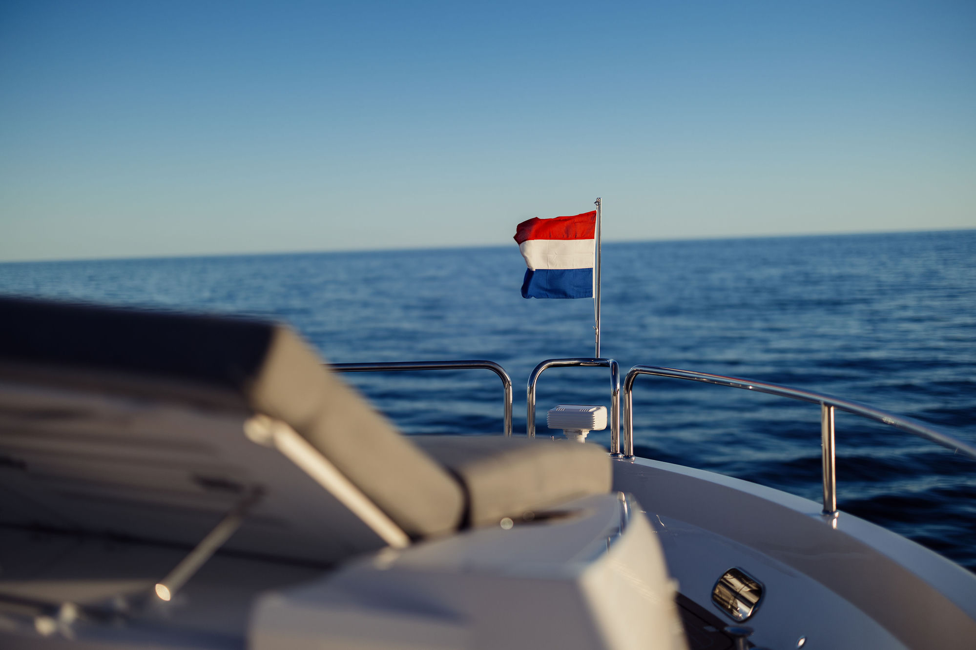 M/Y Junior Sunseeker 88 with Dutch flag on bow — luxury charter yacht