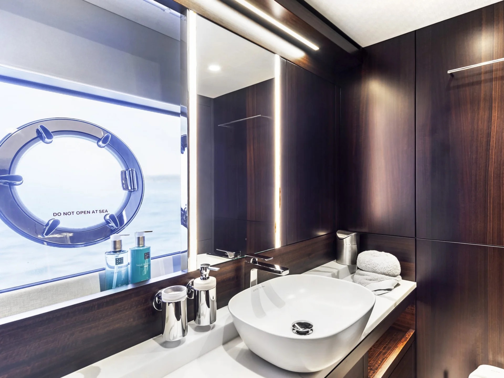 M/Y Junior Sunseeker 88 twin cabin en-suite bathroom — charter accommodation