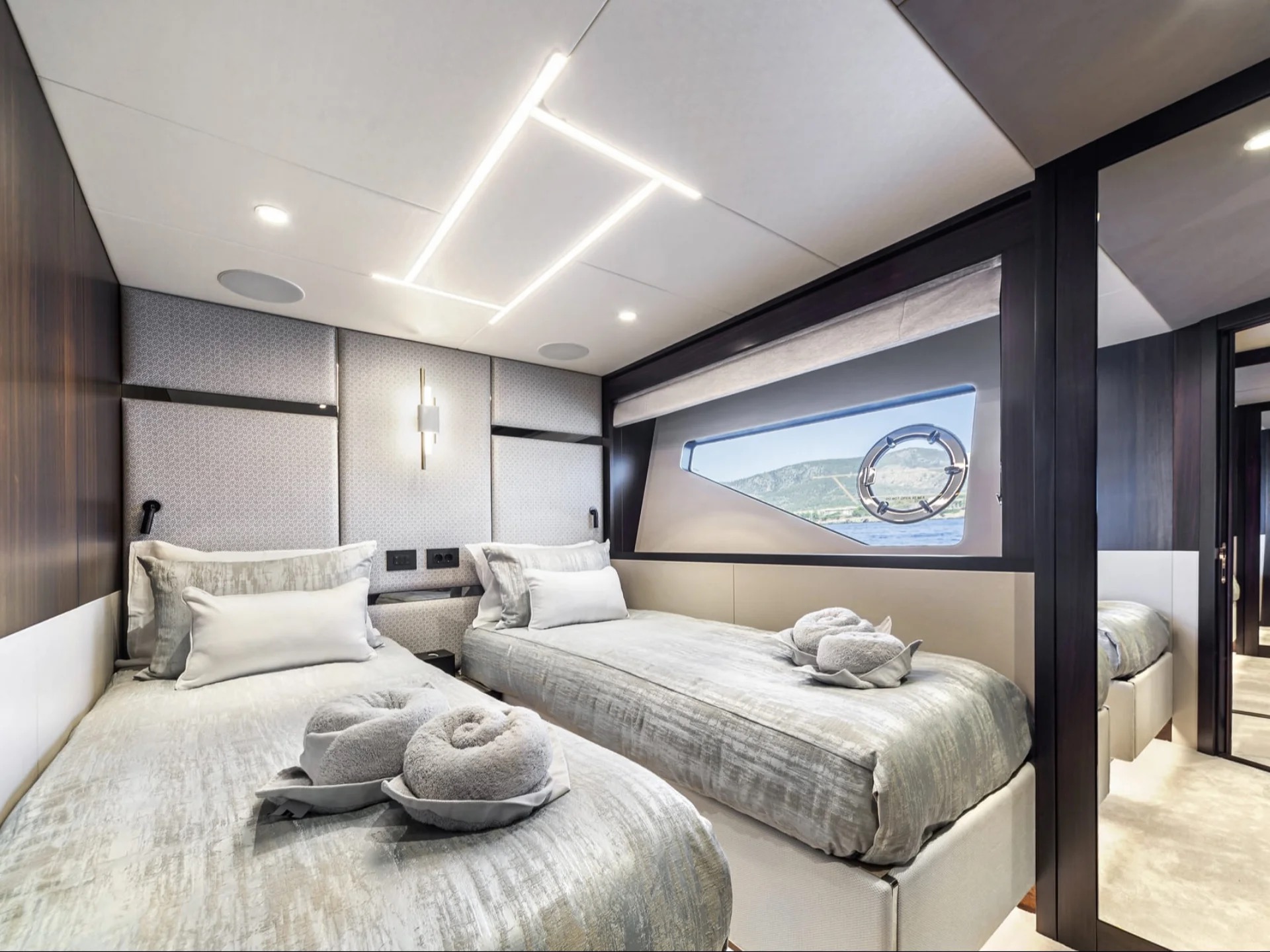 M/Y Junior Sunseeker 88 twin cabin interior — luxury yacht charter accommodation